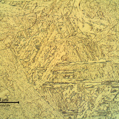Tempered martensitic structure at the weld metal in the cap.