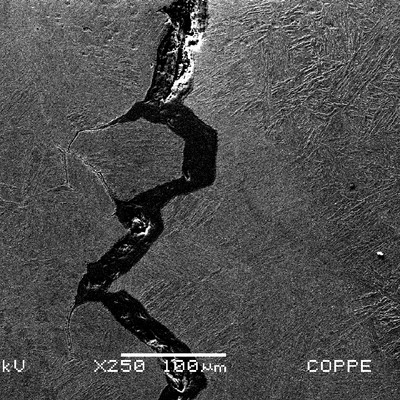 The intergranular morphology of the cracks, at the heat affected zone of the forging, indicates it is a cold cracking probably formed when the welded joint was not yet post welding heat treated. The actual hardness values at the HAZ is 270HV10, and when it was cracked it was probably a lot higher.