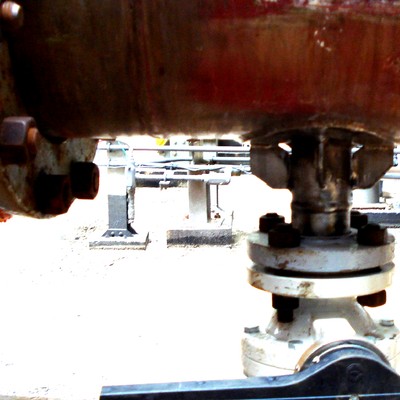 2" drain line from the main 10" line. The leakage occurred at the margin of the weld, a short time after the introduction of the reinforced ribs to reduce vibration.