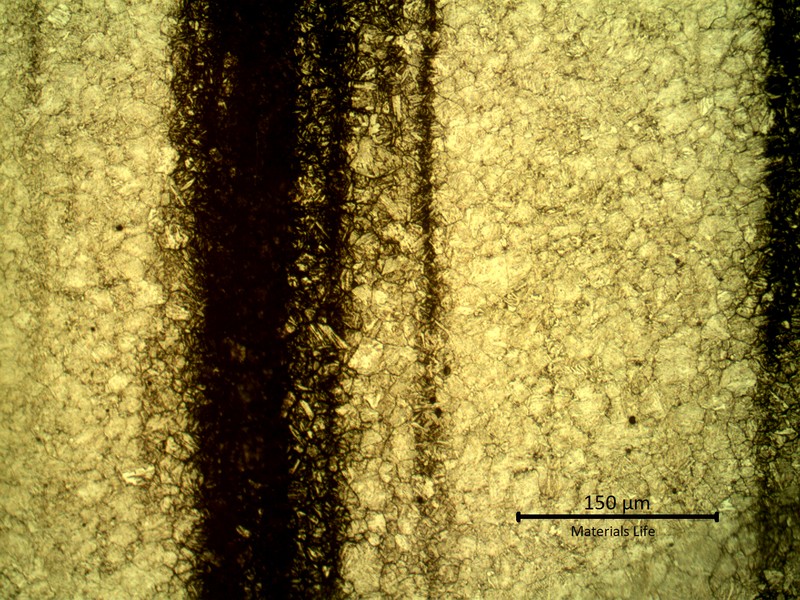 Micrographic detail of the segregated bands.