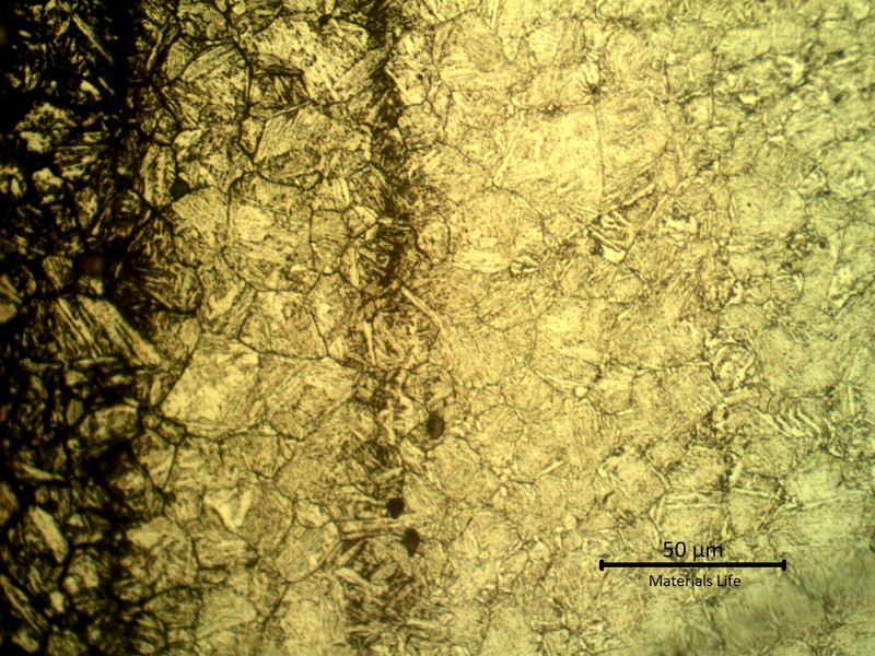 Micrographic etch for revealing previous austenite grain boundaries, that shows the impurities.