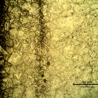 Micrographic etch for revealing previous austenite grain boundaries, that shows the impurities.