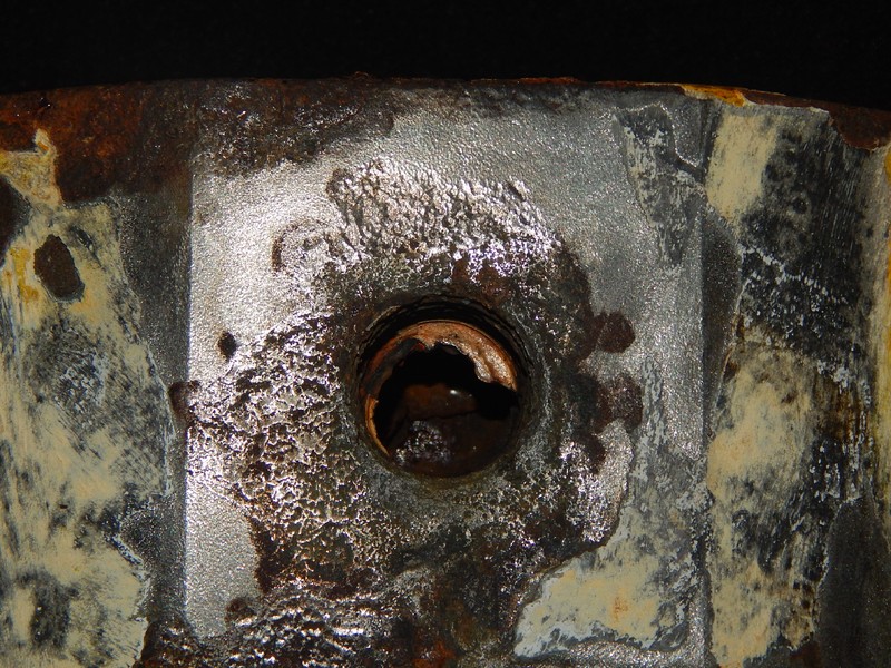 Not only the threads were corroded but all regions under the painting that was detached from the surface.