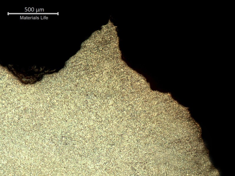 Micrography of the thread at the valve body surface, showing localized dissolution of the thread.