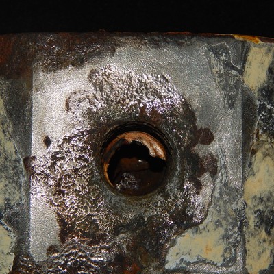 Not only the threads were corroded but all regions under the painting that was detached from the surface.